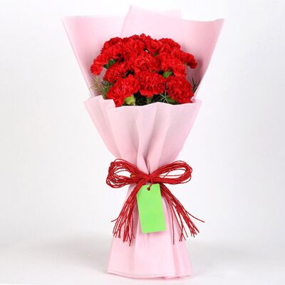 Send 12 Red Carnations Bouquet In Pink Paper to Bangladesh